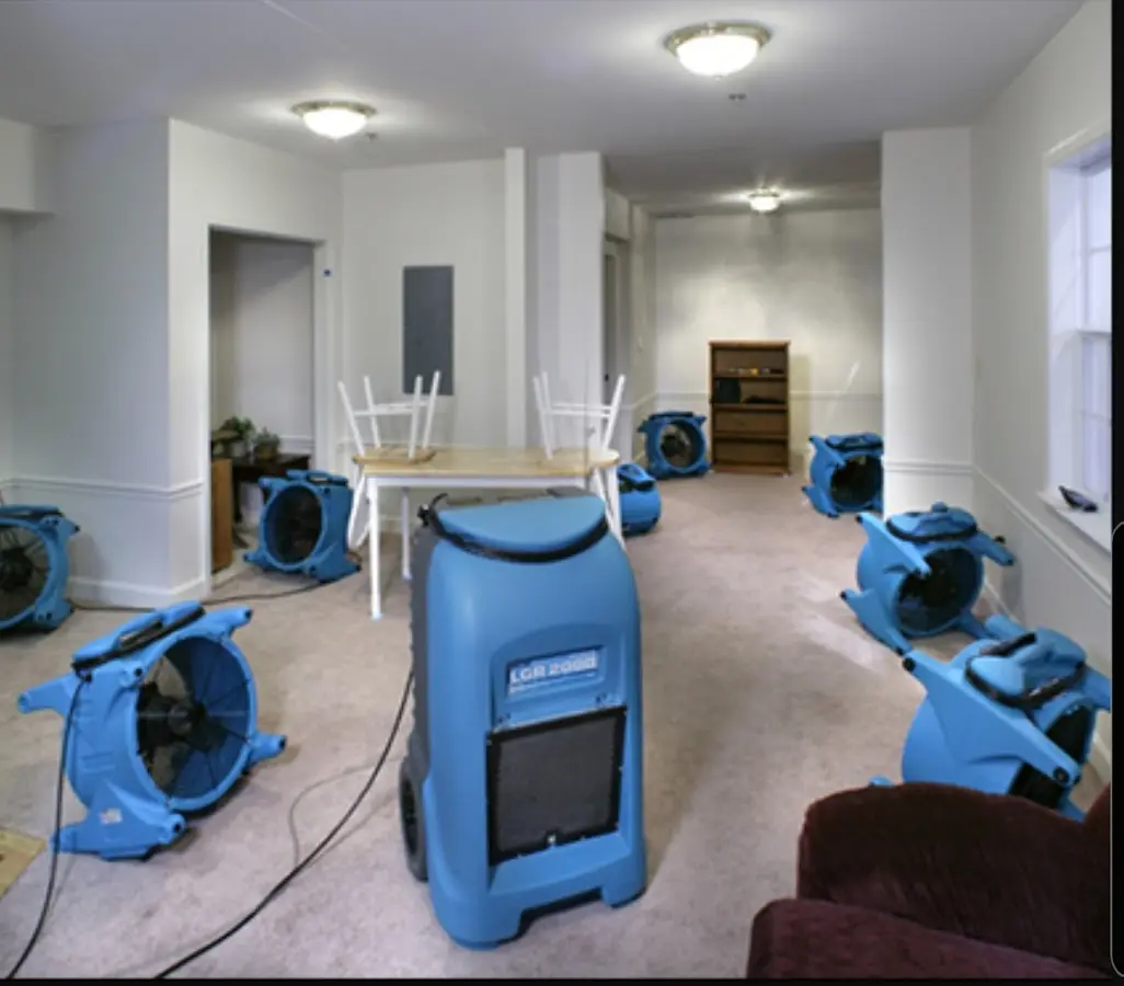 Air movers and dehumidifier setup for Water Damage Restoration in Crestwood